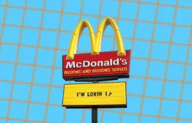 McDonald’s Golden Arches sign reading Billions and Billions Served and I’m Lovin It