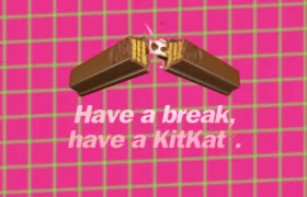Kit Kat bar snapping in half above the Have a Break slogan