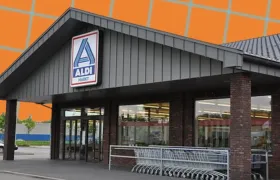 Aldi Markt storefront with logo sign and nested shopping carts