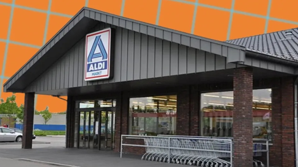 Aldi Markt storefront with logo sign and nested shopping carts