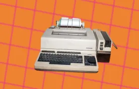 Vintage Siemens telex teleprinter machine with keyboard and paper roll