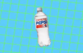 Crystal Pepsi clear cola bottle on blue and green grid background