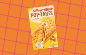 Vintage Kellogg's Raspberry-Apple Pop-Tarts box on orange grid background