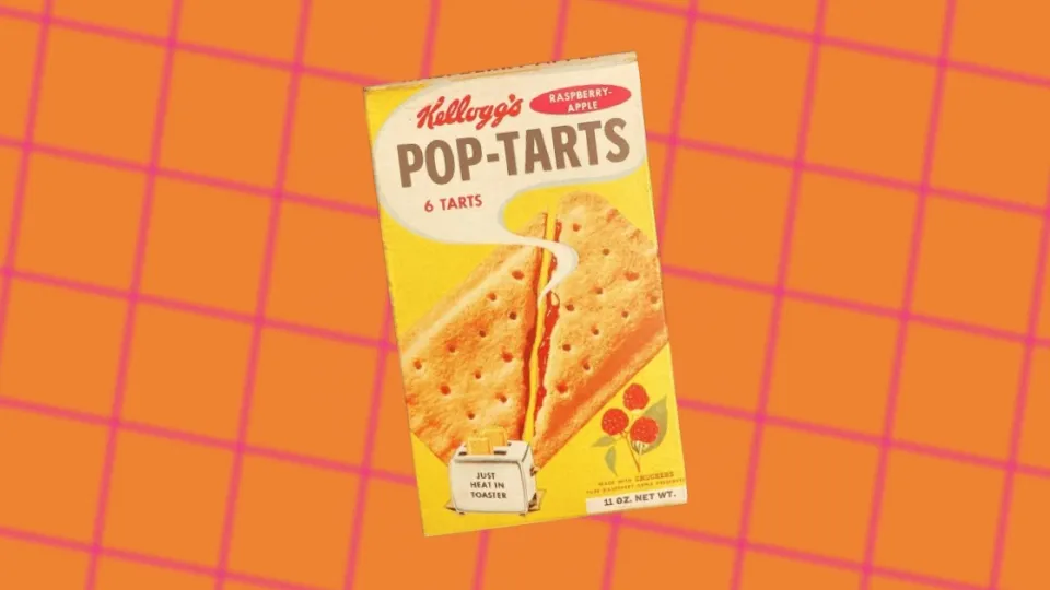 Vintage Kellogg's Raspberry-Apple Pop-Tarts box on orange grid background