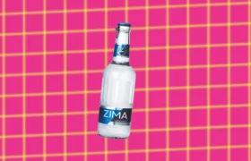 Zima clear malt beverage bottle on pink grid background