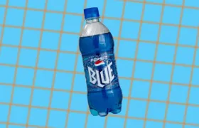 Blue Pepsi Blue berry cola soda bottle on light blue grid background