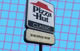 Pizza Hut Classic road sign reading No One OutPizzas The Hut