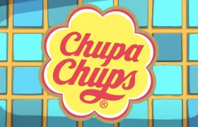 Chupa Chups flower logo in yellow and red on blue tiles
