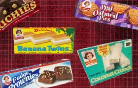 Five vintage Little Debbie snack boxes on a red grid background