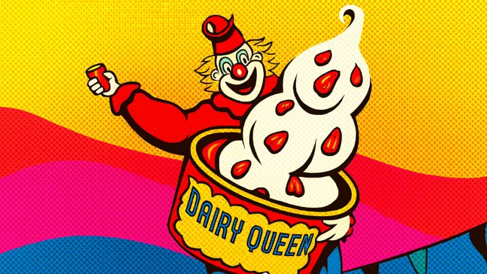 Cartoon Dairy Queen clown mascot popping out of a soft-serve cup